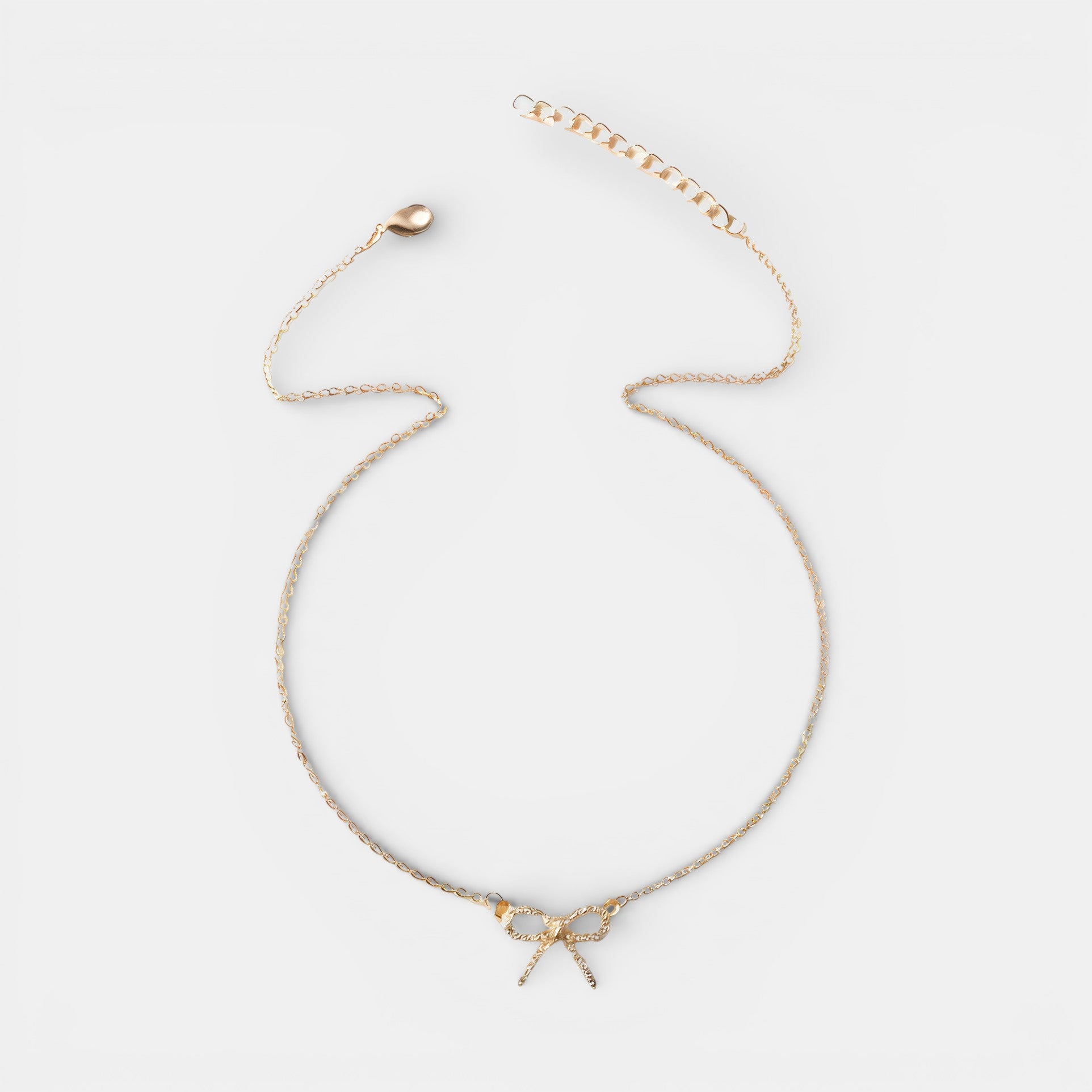 Noviqlo | Dainty Bow Pendant Necklace in Gold or Silver Colour